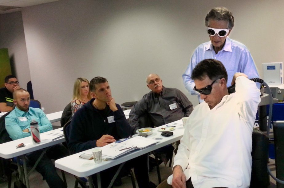Demonstrating laser therapy techniques