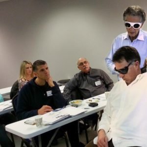 Demonstrating laser therapy techniques